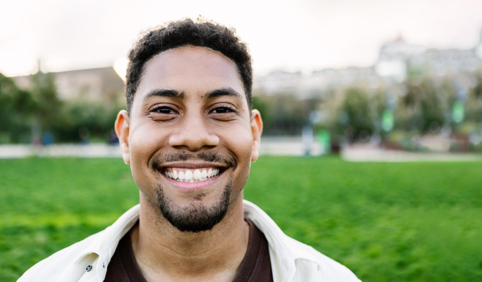 smiling-portrait-of-young-gen-z-man-looking-at-cam-2025-03-11-17-22-20-utc.jpg